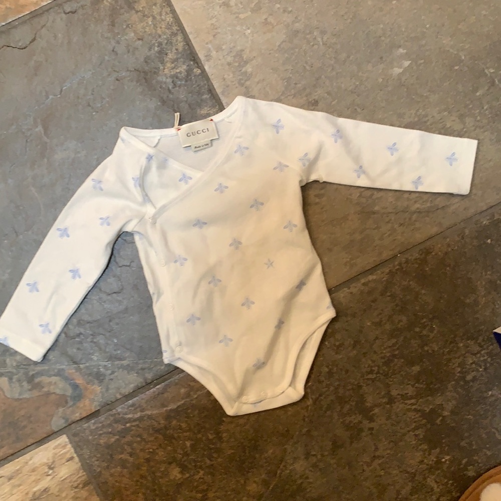 Gucci baby onesie. 3-6 months new without tag. Great condition.